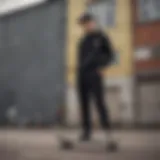 Stylish black chino joggers paired with a skateboard