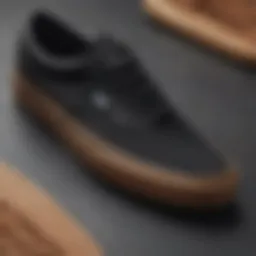 A close-up of black Vans with tan soles showcasing the intricate design details.