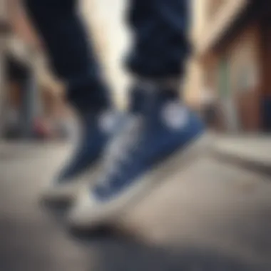 A group of skateboarders wearing navy Converse All Stars in an urban setting