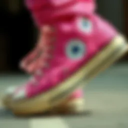 Close-up of pink Converse sneakers highlighting details