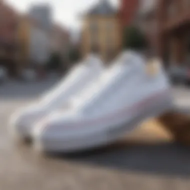 All-white low-top platform Converse shoes placed on a skateboard, emphasizing their role in skate culture