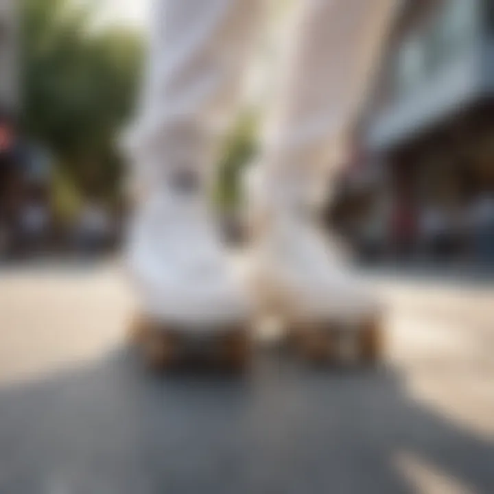 Skateboarder performing a trick while wearing all-white low-top platform Converse shoes