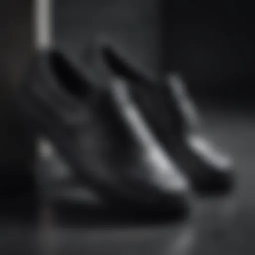 Close-up view of black Adidas slip-on shoes showcasing their sleek design.