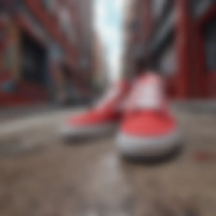 Red Vans displayed in a street setting with graffiti background