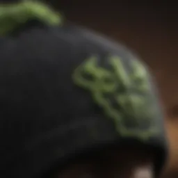 A close-up of a Monster Energy beanie showcasing its unique design and logo.