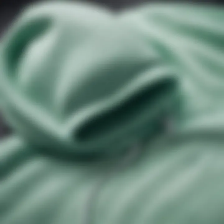 Close-up of mint hoodie fabric highlighting its texture and quality