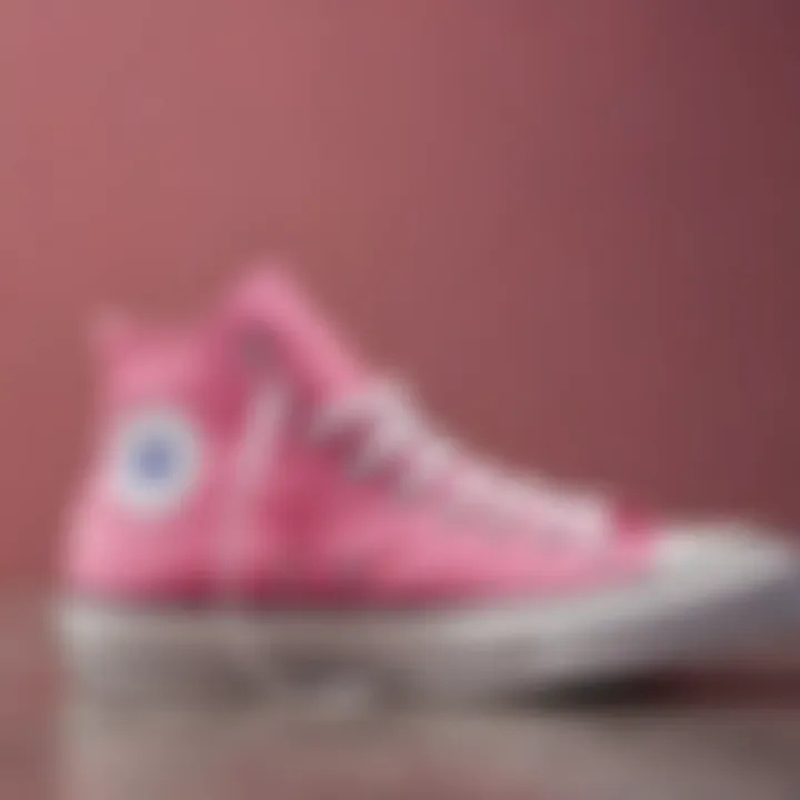 A close-up of a size 10 pink Converse sneaker against a stylish backdrop
