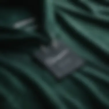 Close-up of the fabric texture of the dark green Champion hoodie