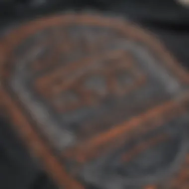 A close-up of the intricate designs on a graphic t-shirt.