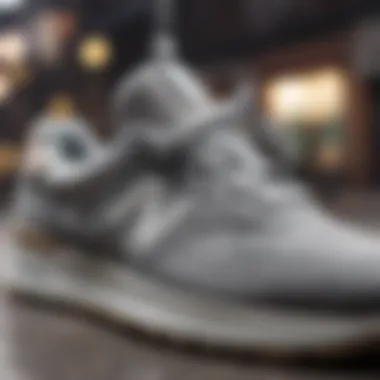 Close-up of the design features of gray New Balance shoes