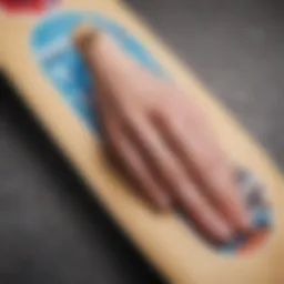 A vibrant skateboard deck adorned with a middle finger sticker