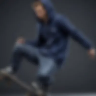 Skateboarder wearing a navy blue zip-up hoodie while performing a trick