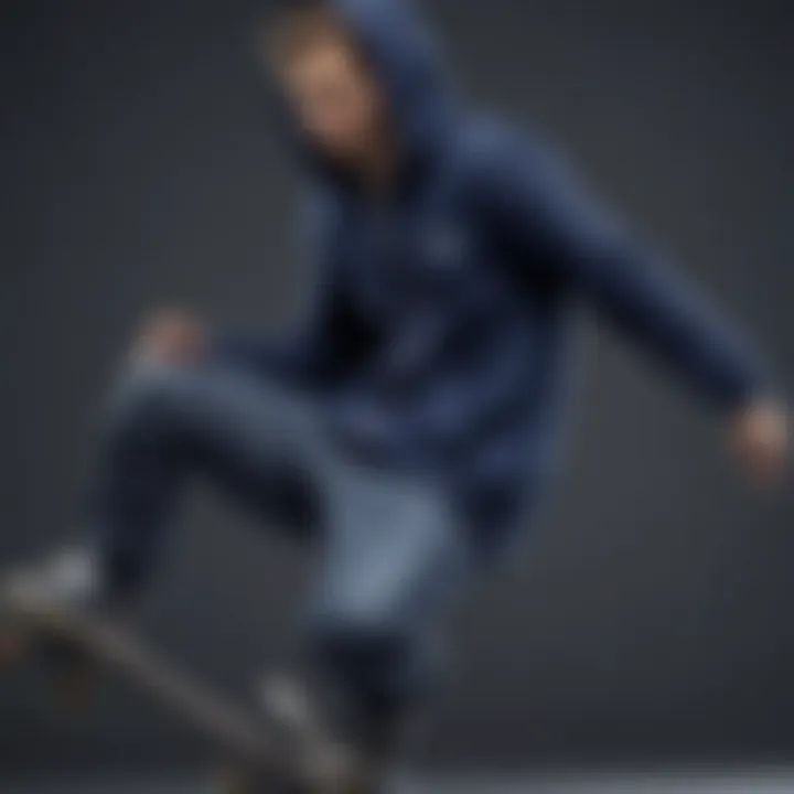 Skateboarder wearing a navy blue zip-up hoodie while performing a trick