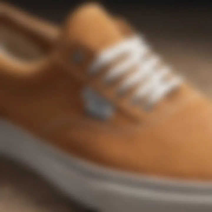 Close-up of tan suede Vans showcasing texture and stitching details