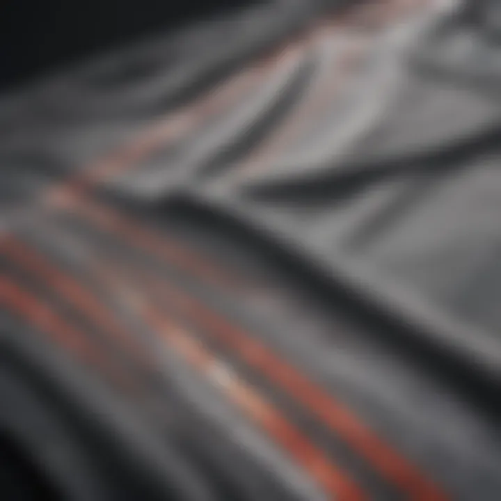 Close-up of fabric and design details of an elongated t-shirt.